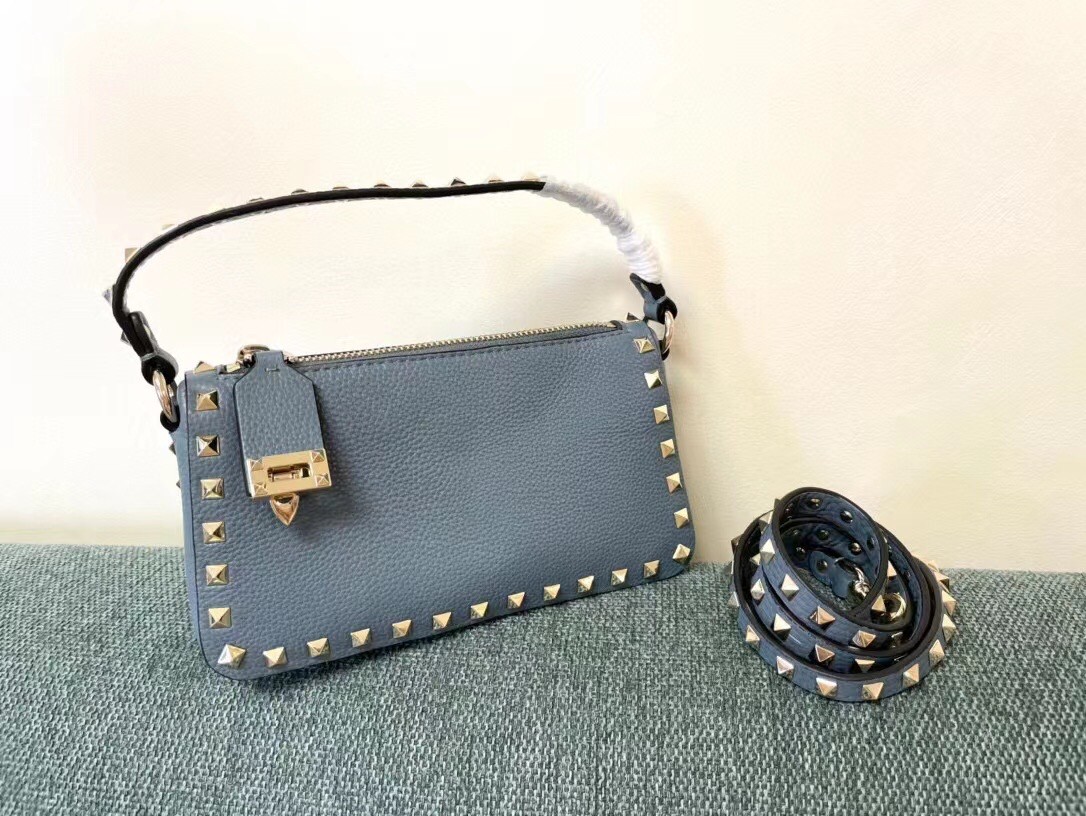 Va1e*ntin0 rockstud small crossbody bag in blue grained calfskin