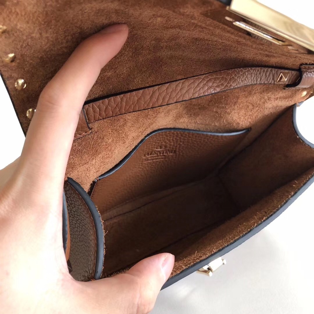 Va1e*ntin0 rockstud small crossbody bag in brown grained leather