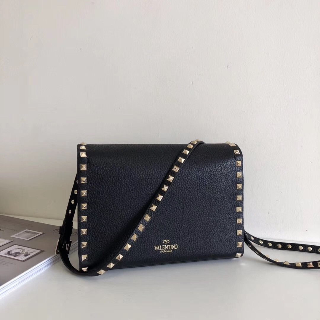 Va1e*ntin0 rockstud small crossbody bag in black grained leather