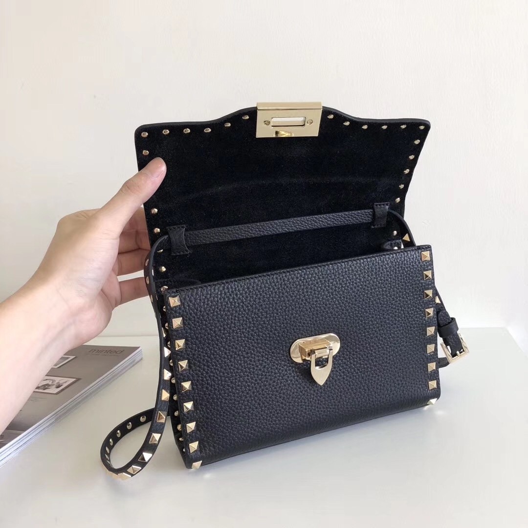 Va1e*ntin0 rockstud small crossbody bag in black grained leather