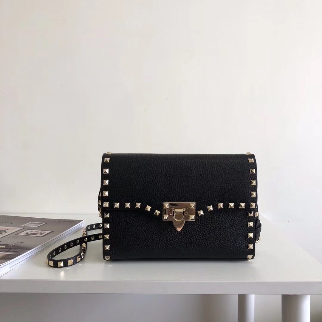 Va1e*ntin0 rockstud small crossbody bag in black grained leather