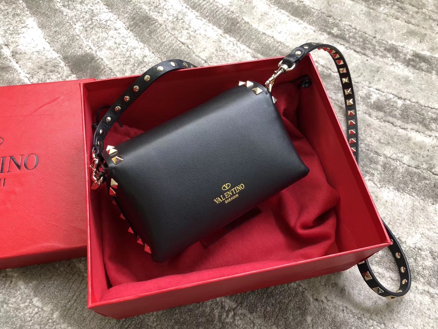 Va1e*ntin0 mini rockstud crossbody bag in black calfskin