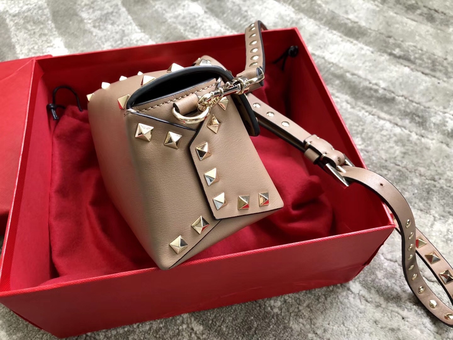 Va1e*ntin0 mini rockstud crossbody bag in poudre calfskin