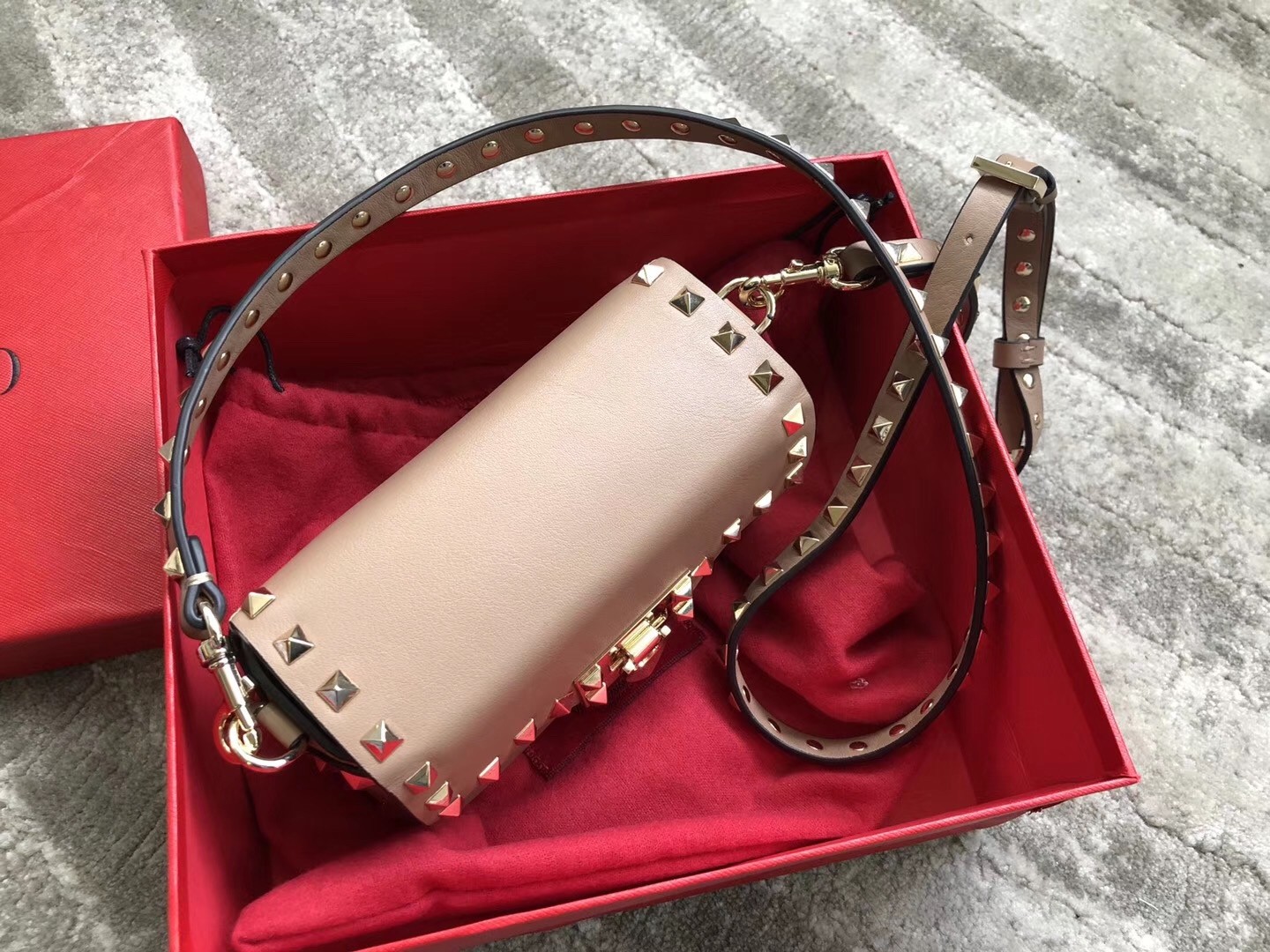 Va1e*ntin0 mini rockstud crossbody bag in poudre calfskin