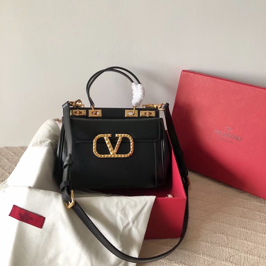 Va1e*ntin0 rockstud alcove medium top handle bag in black calfskin