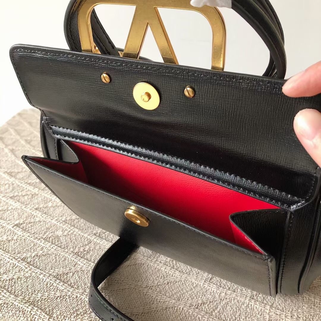 Va1e*ntin0 rockstud alcove medium top handle bag in black calfskin