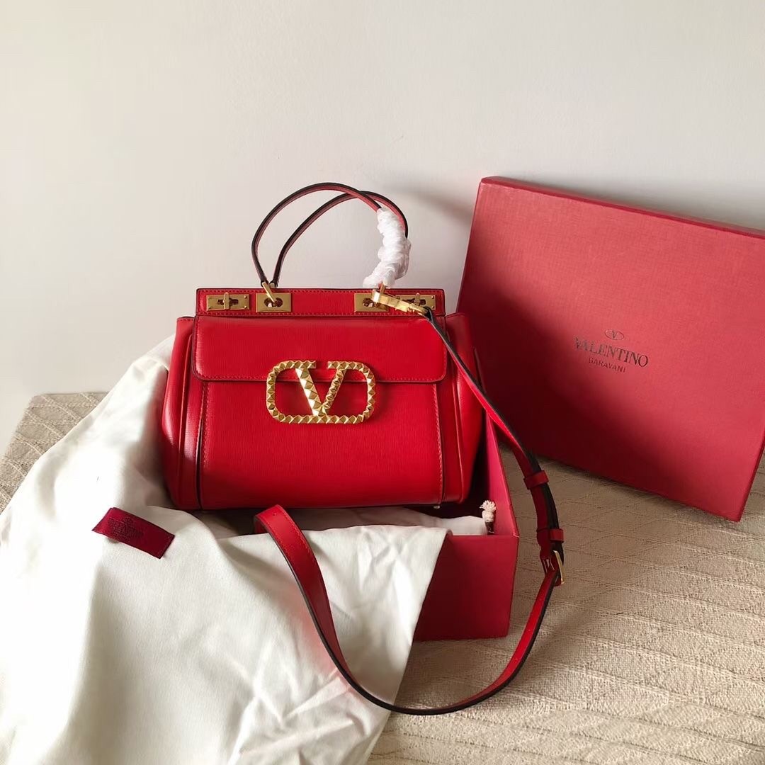 Va1e*ntin0 rockstud alcove medium top handle bag in red calfskin