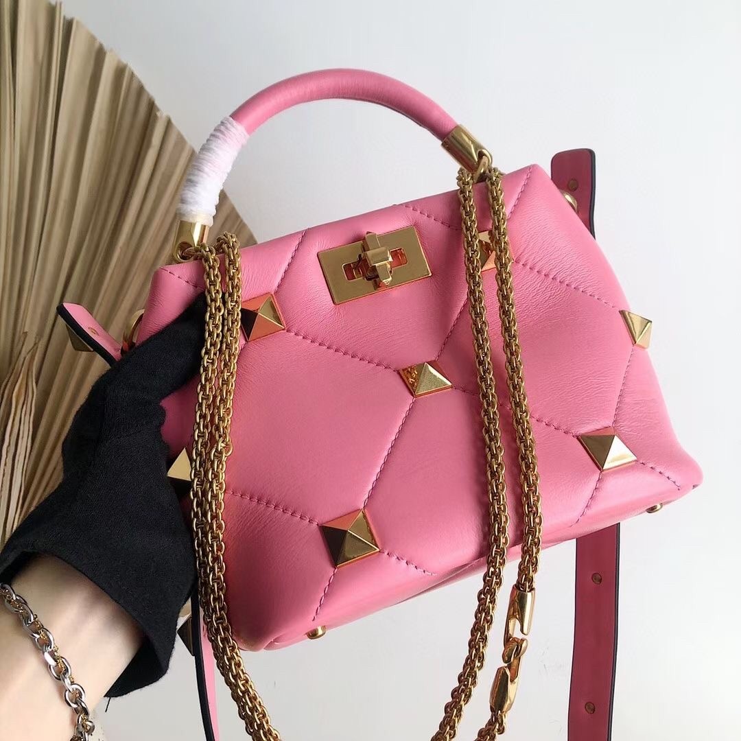 Va1e*ntin0 small roman stud top handle bag in flamingo nappa