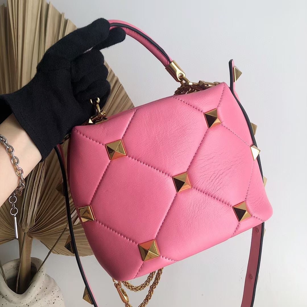 Va1e*ntin0 small roman stud top handle bag in flamingo nappa