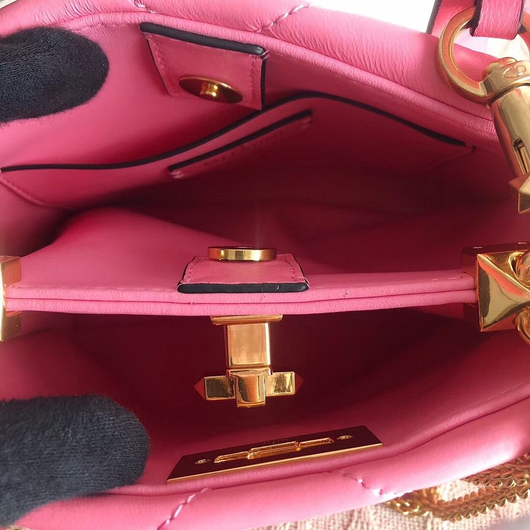 Va1e*ntin0 small roman stud top handle bag in flamingo nappa
