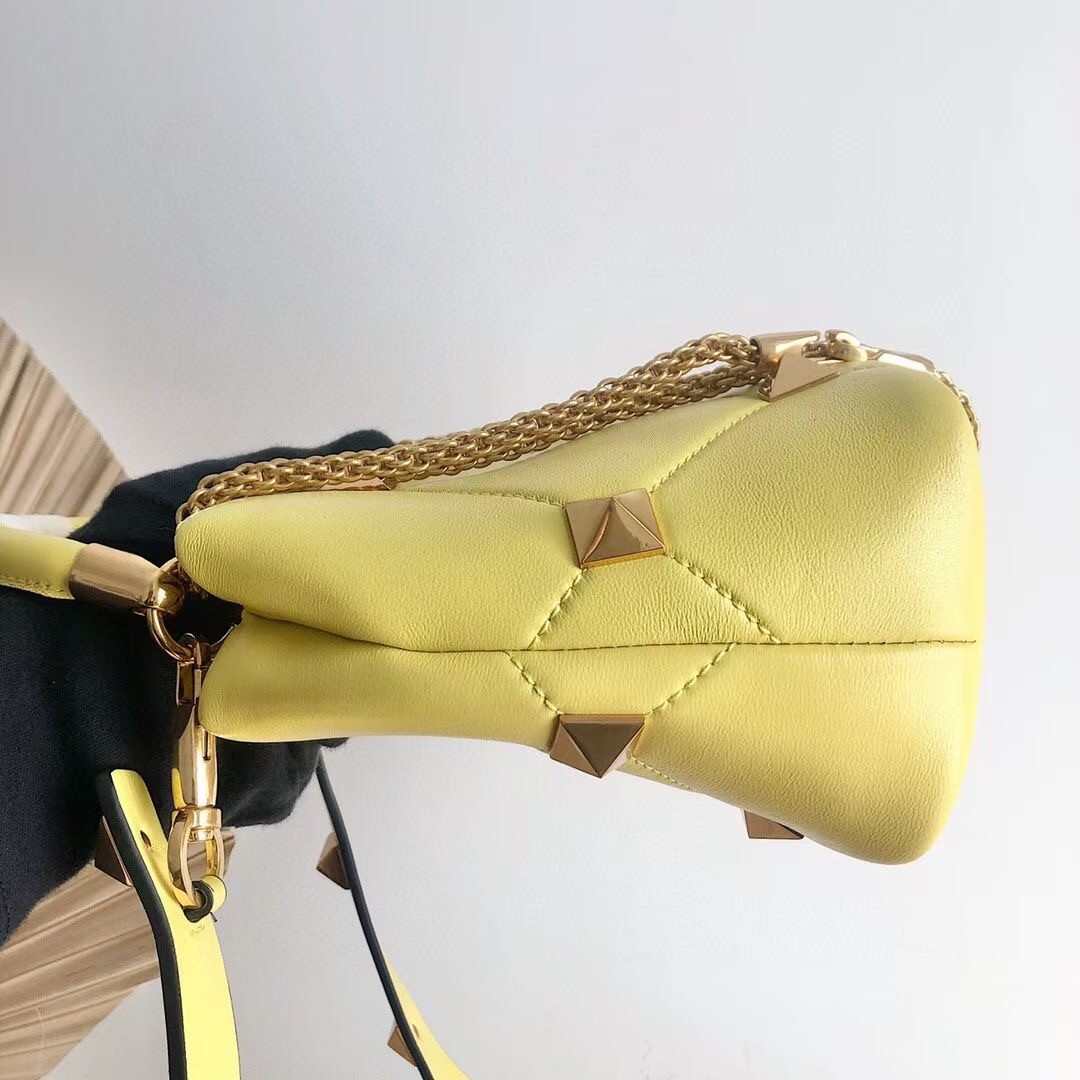 Va1e*ntin0 small roman stud top handle bag in yellow nappa