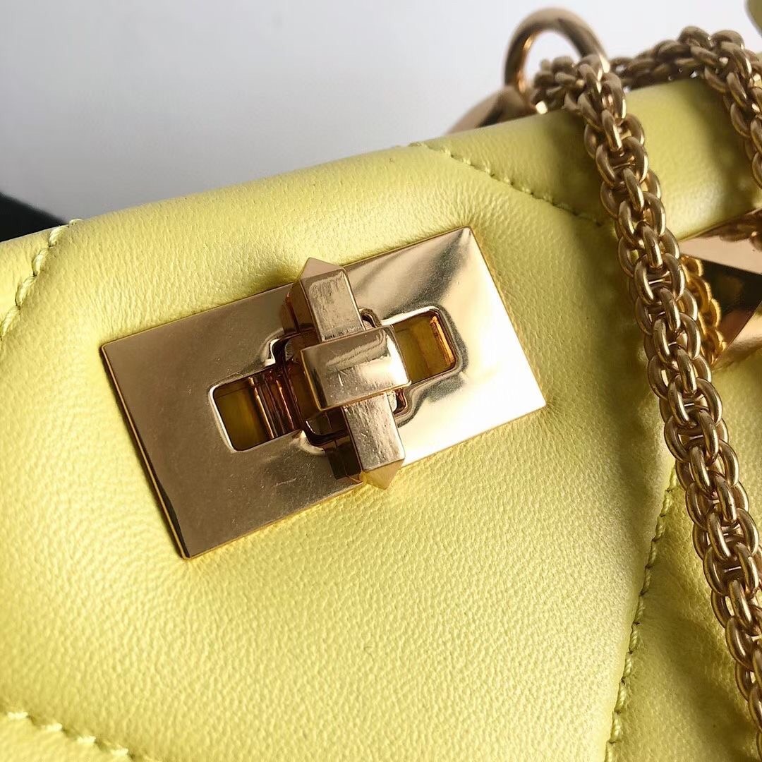 Va1e*ntin0 small roman stud top handle bag in yellow nappa