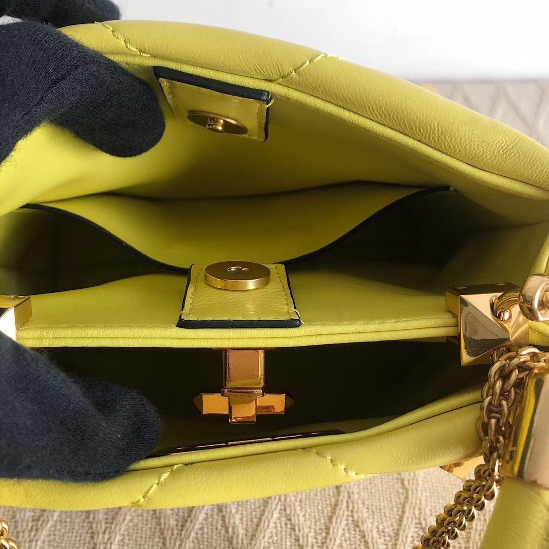 Va1e*ntin0 small roman stud top handle bag in yellow nappa