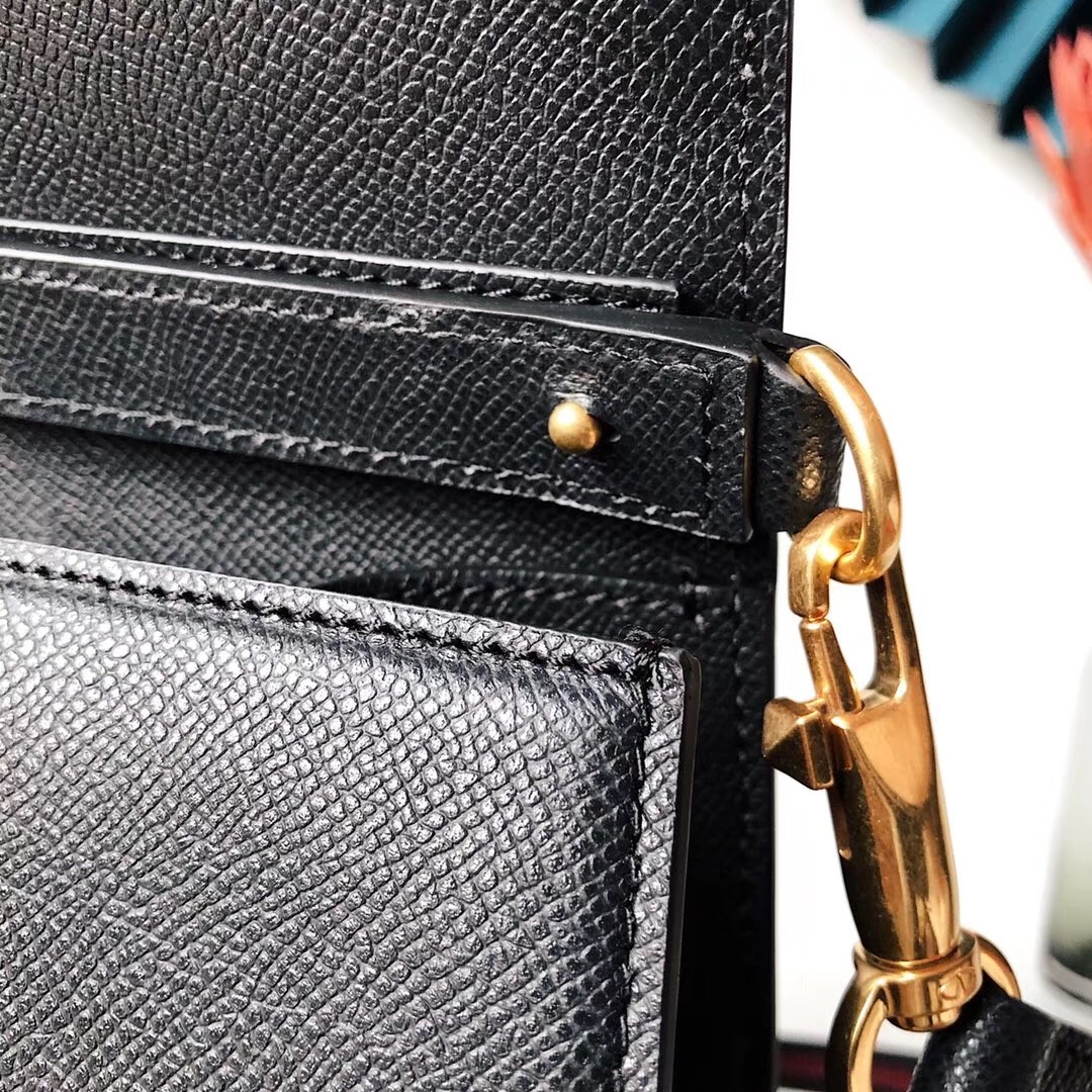 Va1e*ntin0 small vsling handbag in black grainy calfskin