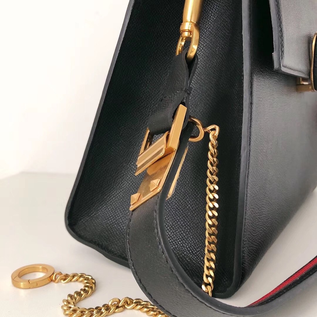 Va1e*ntin0 vsling handbag in black grainy calfskin