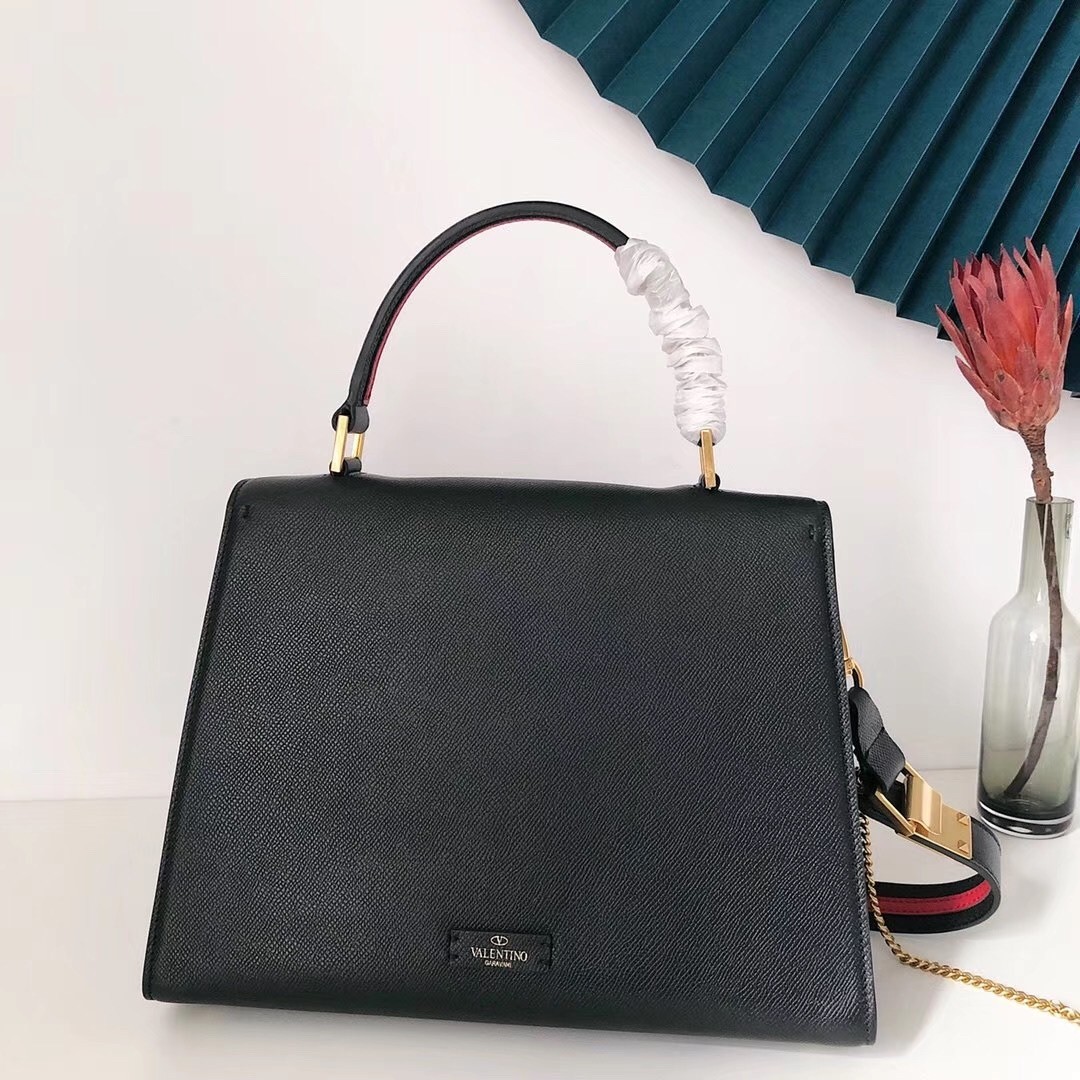 Va1e*ntin0 vsling handbag in black grainy calfskin