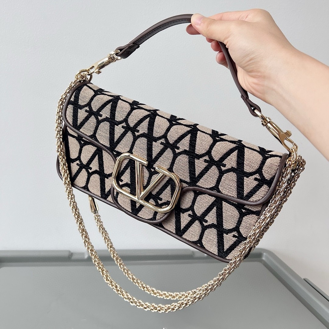 Va1e*ntin0 large loco shoulder bag in black toile iconographe