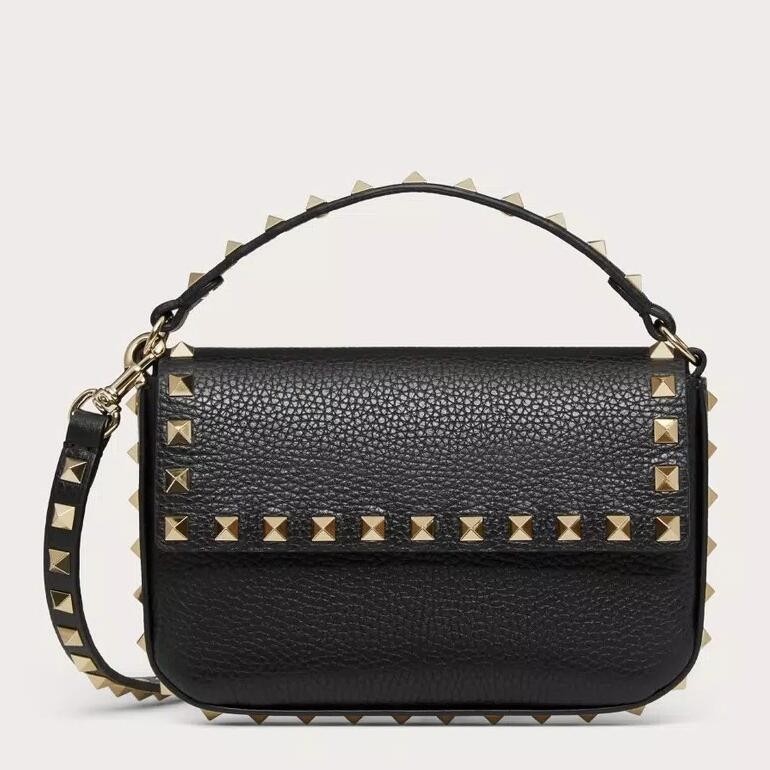 Va1e*ntin0 rockstud pouch bag in black grained leather