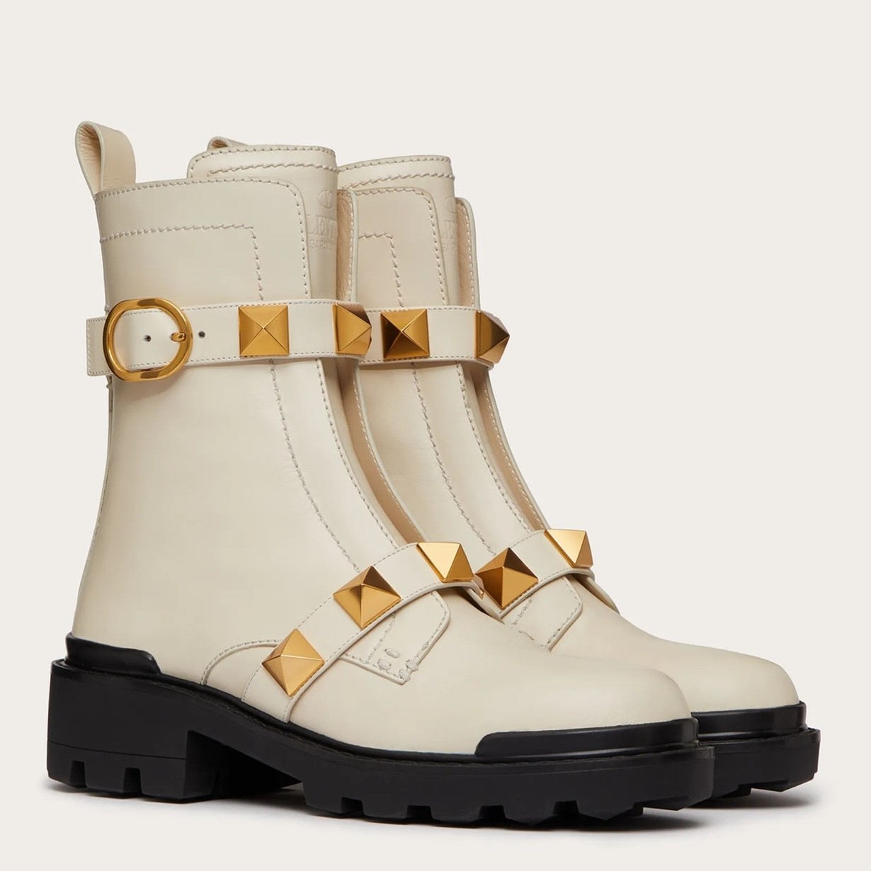 Va1e*ntin0 roman stud combat boots in white calfskin