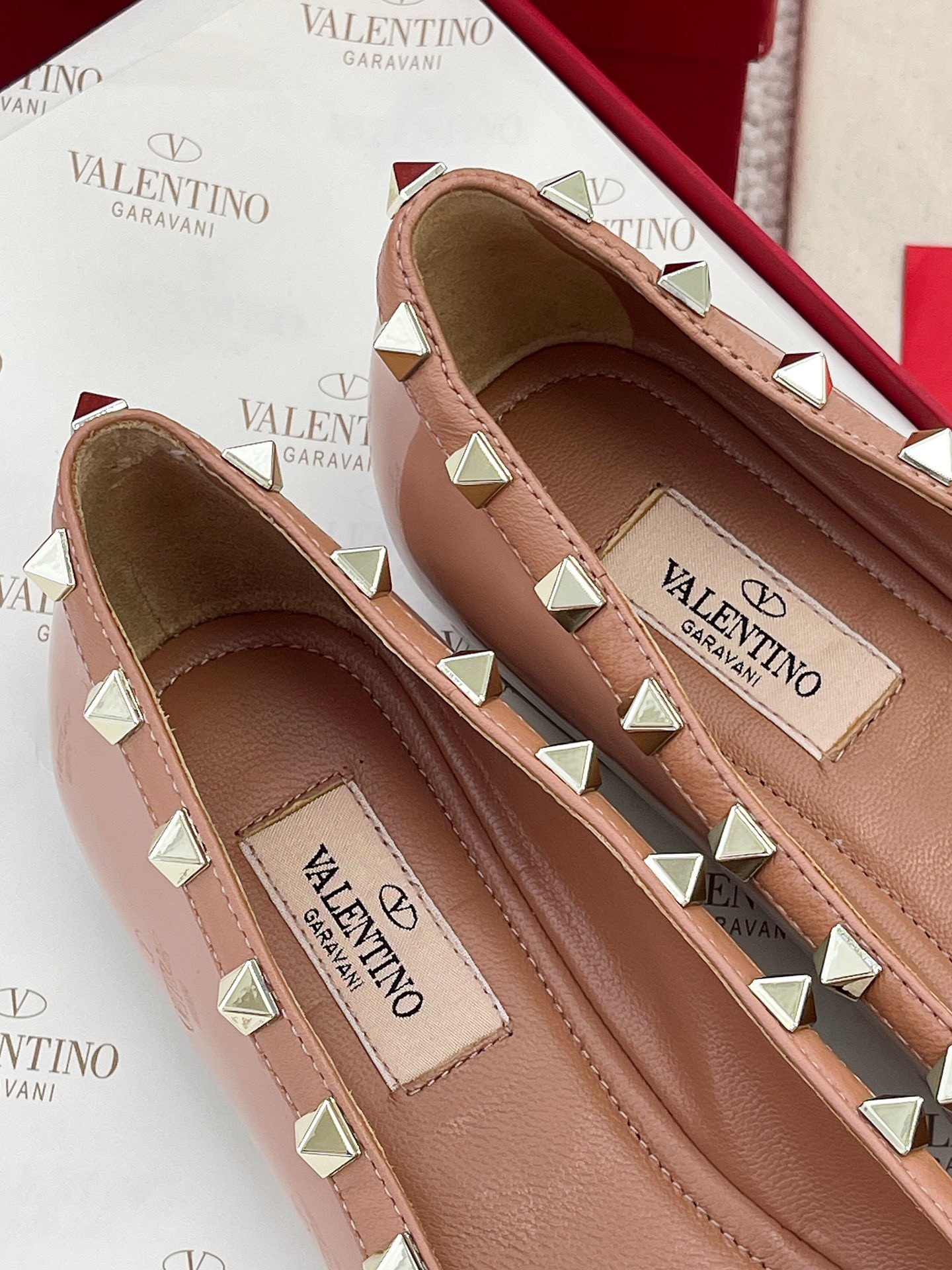 Va1e*ntin0 rockstud ballerina in rose cannelle patent leather