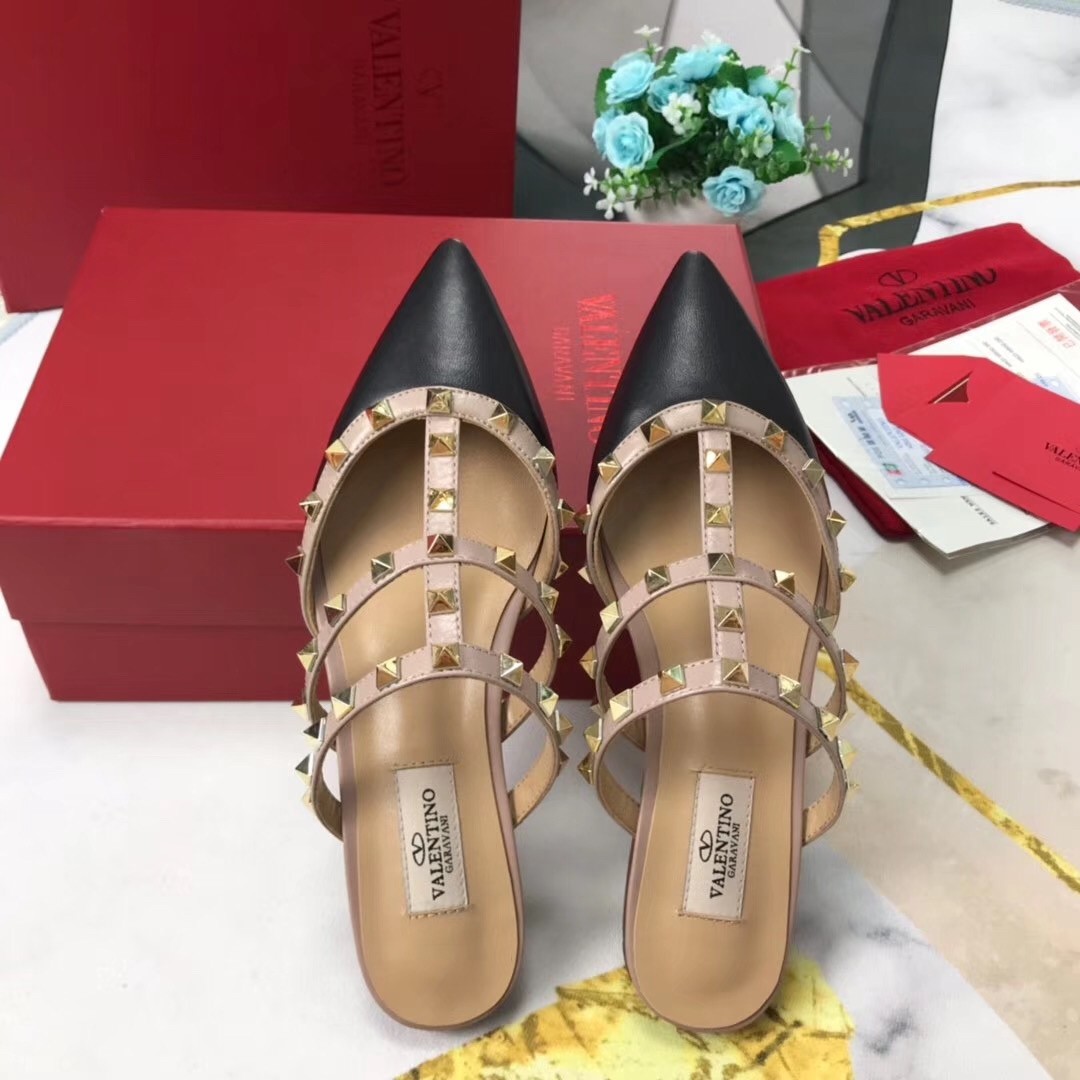 Va1e*ntin0 rockstud flat mules in black nappa leather