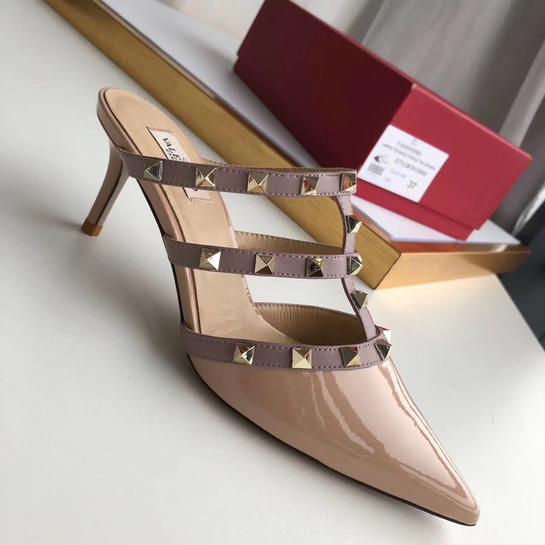 Va1e*ntin0 rockstud mules 50mm in nude patent leather
