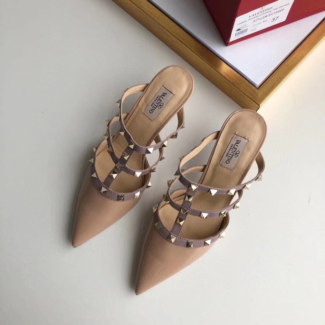 Va1e*ntin0 rockstud mules 50mm in nude patent leather