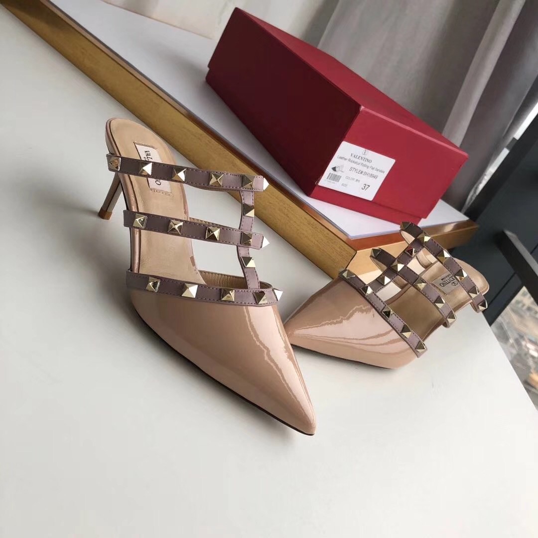 Va1e*ntin0 rockstud mules 50mm in nude patent leather