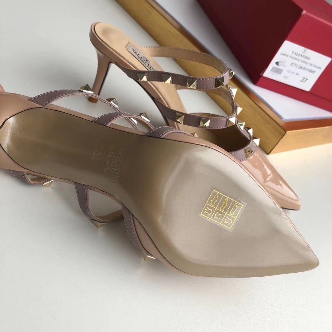 Va1e*ntin0 rockstud mules 50mm in nude patent leather
