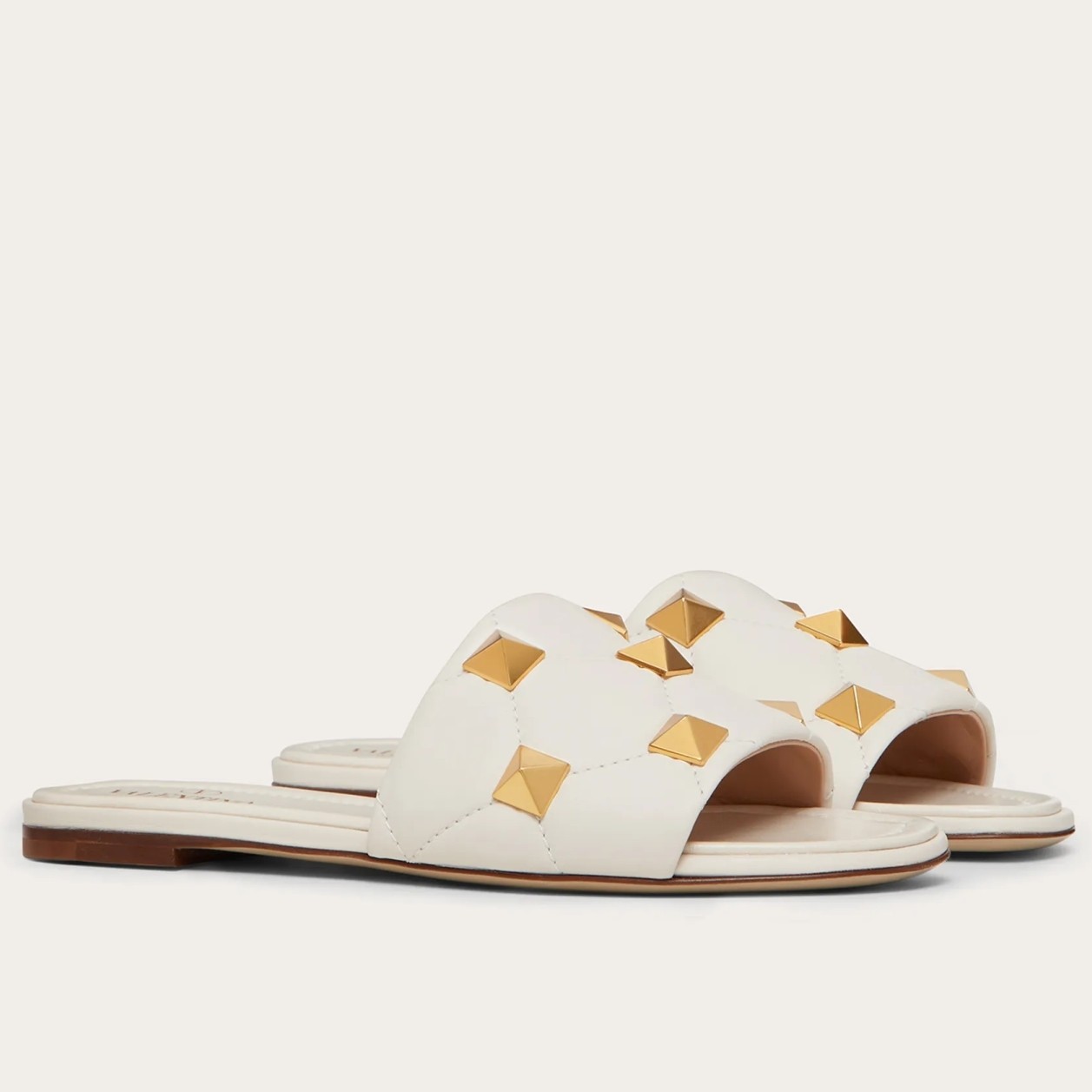 Va1e*ntin0 roman stud flat slides in white quilted nappa