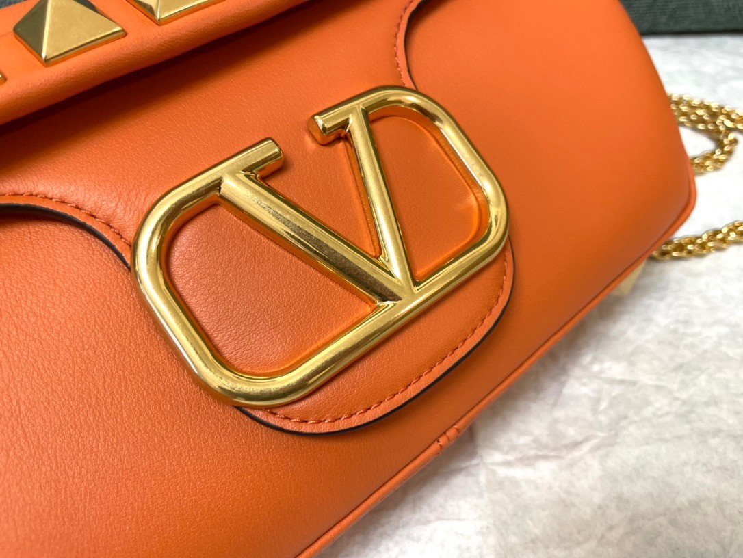 Va1e*ntin0 stud sign shoulder bag in orange nappa leather