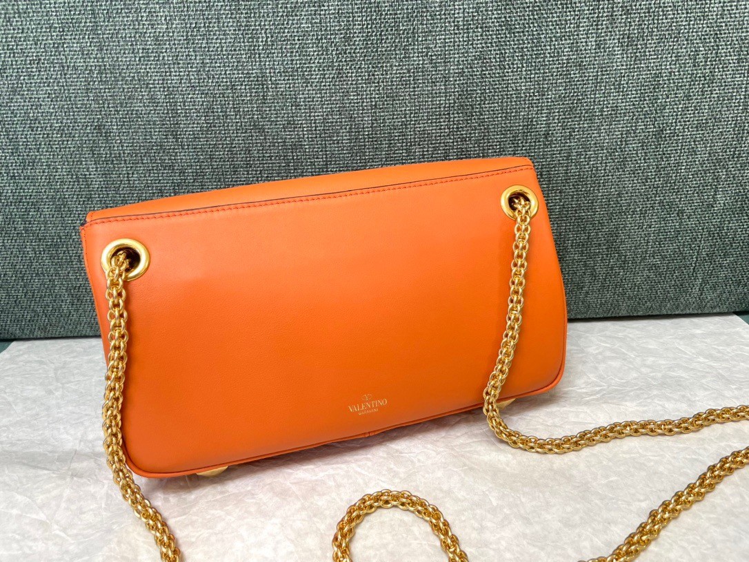 Va1e*ntin0 stud sign shoulder bag in orange nappa leather