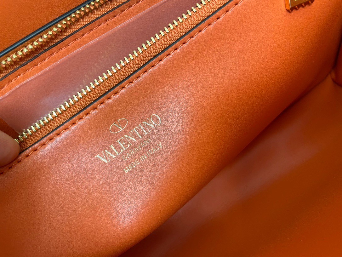 Va1e*ntin0 stud sign shoulder bag in orange nappa leather