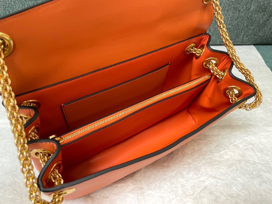 Va1e*ntin0 stud sign shoulder bag in orange nappa leather