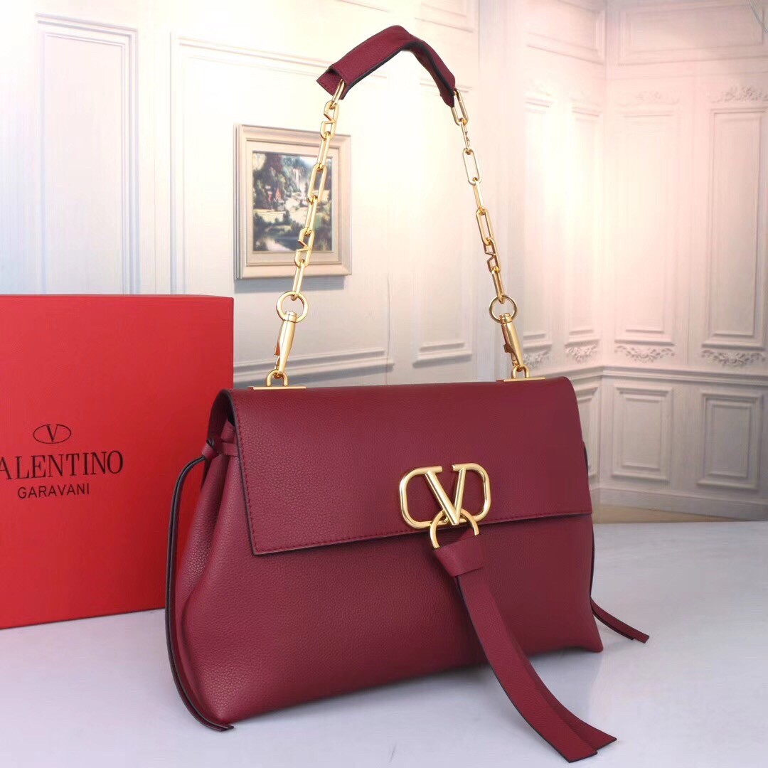 Va1e*ntin0 medium vring chain bag in bordeaux grainy calfskin