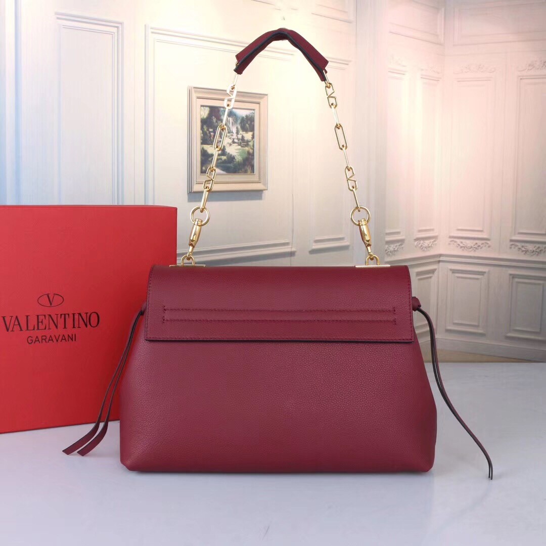 Va1e*ntin0 medium vring chain bag in bordeaux grainy calfskin