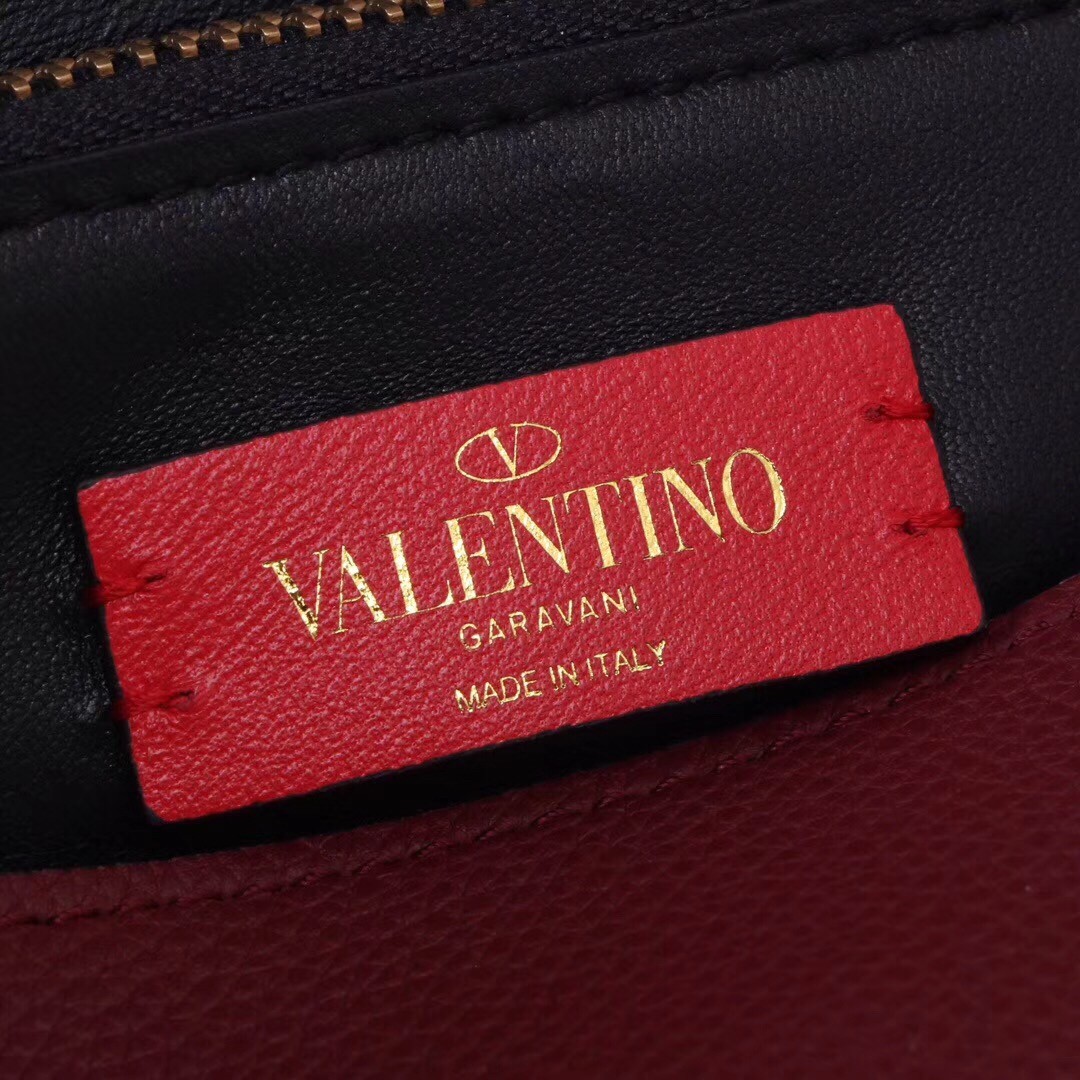 Va1e*ntin0 medium vring chain bag in bordeaux grainy calfskin