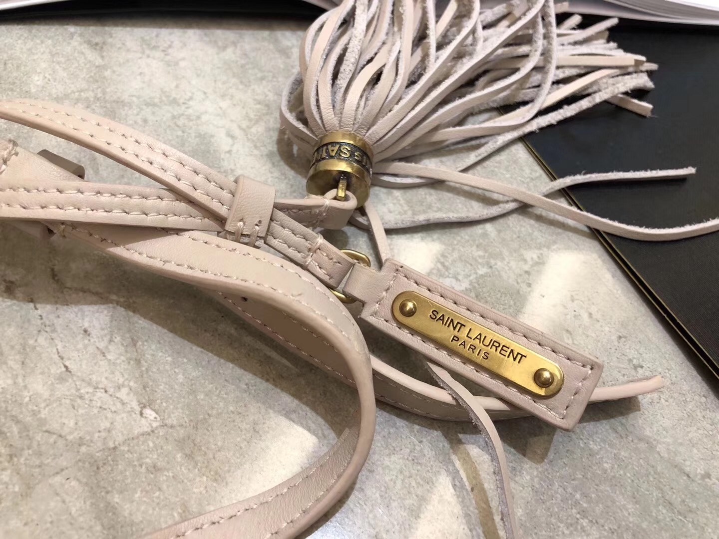Sa**t Lau*nt lou belt bag in blanc matelasse leather