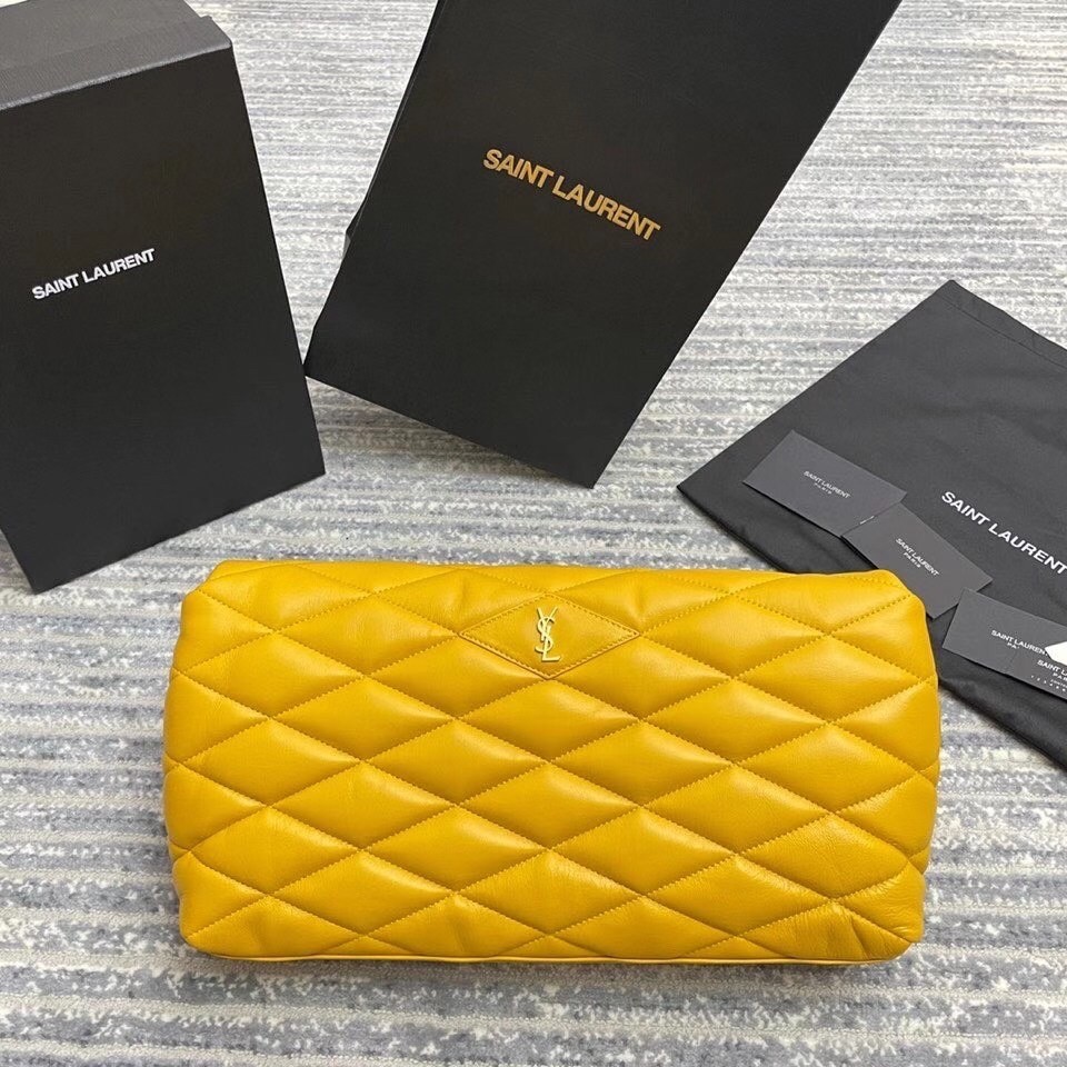 Sa**t Lau*nt sade puffer envelope clutch in yellow lambskin