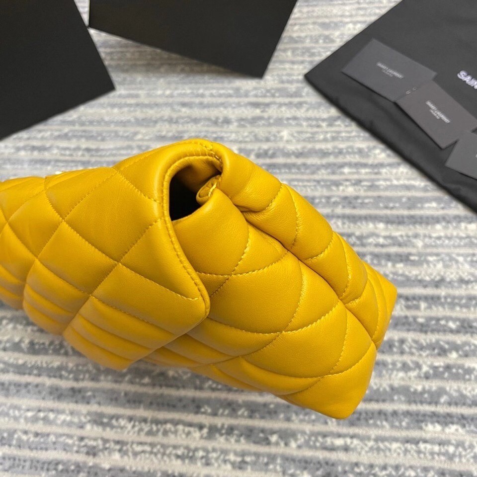 Sa**t Lau*nt sade puffer envelope clutch in yellow lambskin