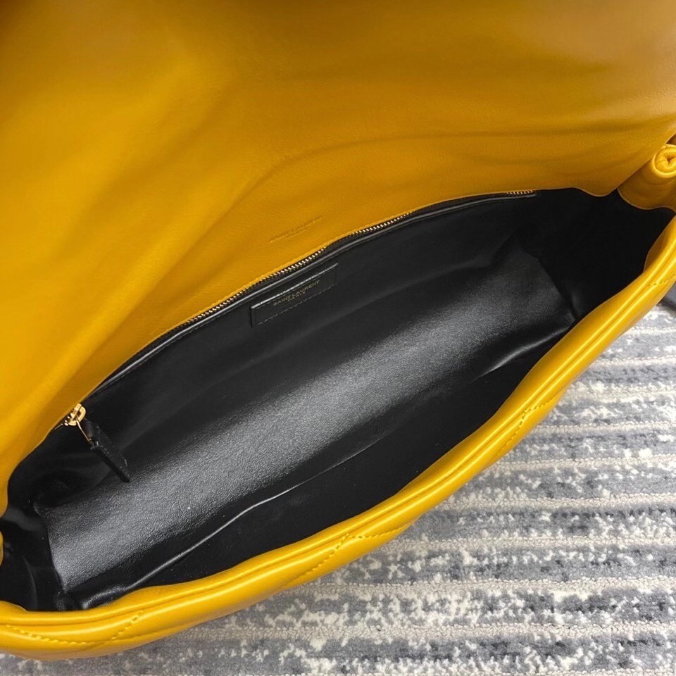 Sa**t Lau*nt sade puffer envelope clutch in yellow lambskin