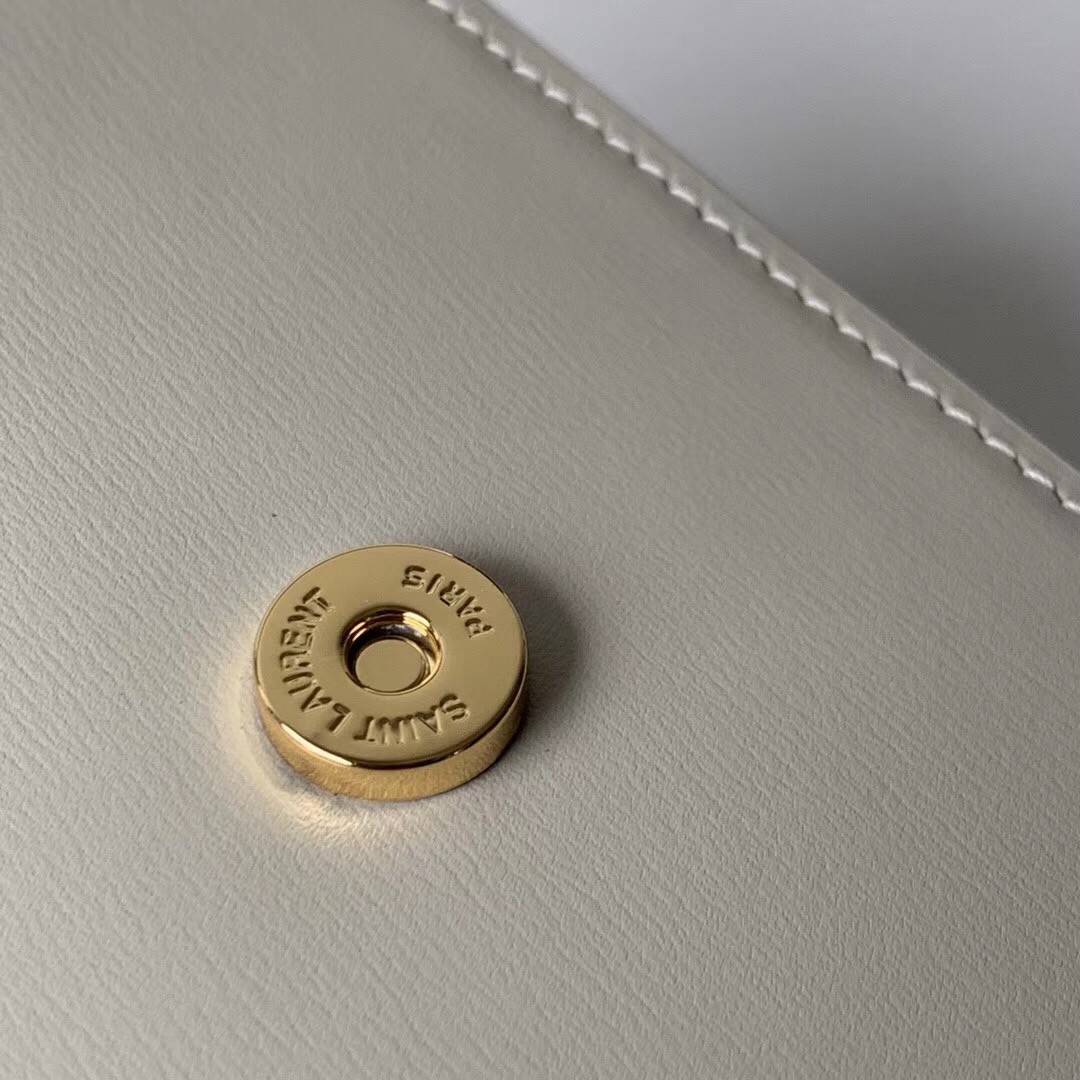 Sa**t Lau*nt le 61 small saddle bag in white leather
