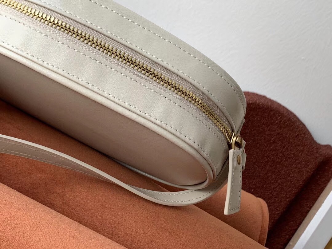 Sa**t Lau*nt le 61 camera bag in white leather