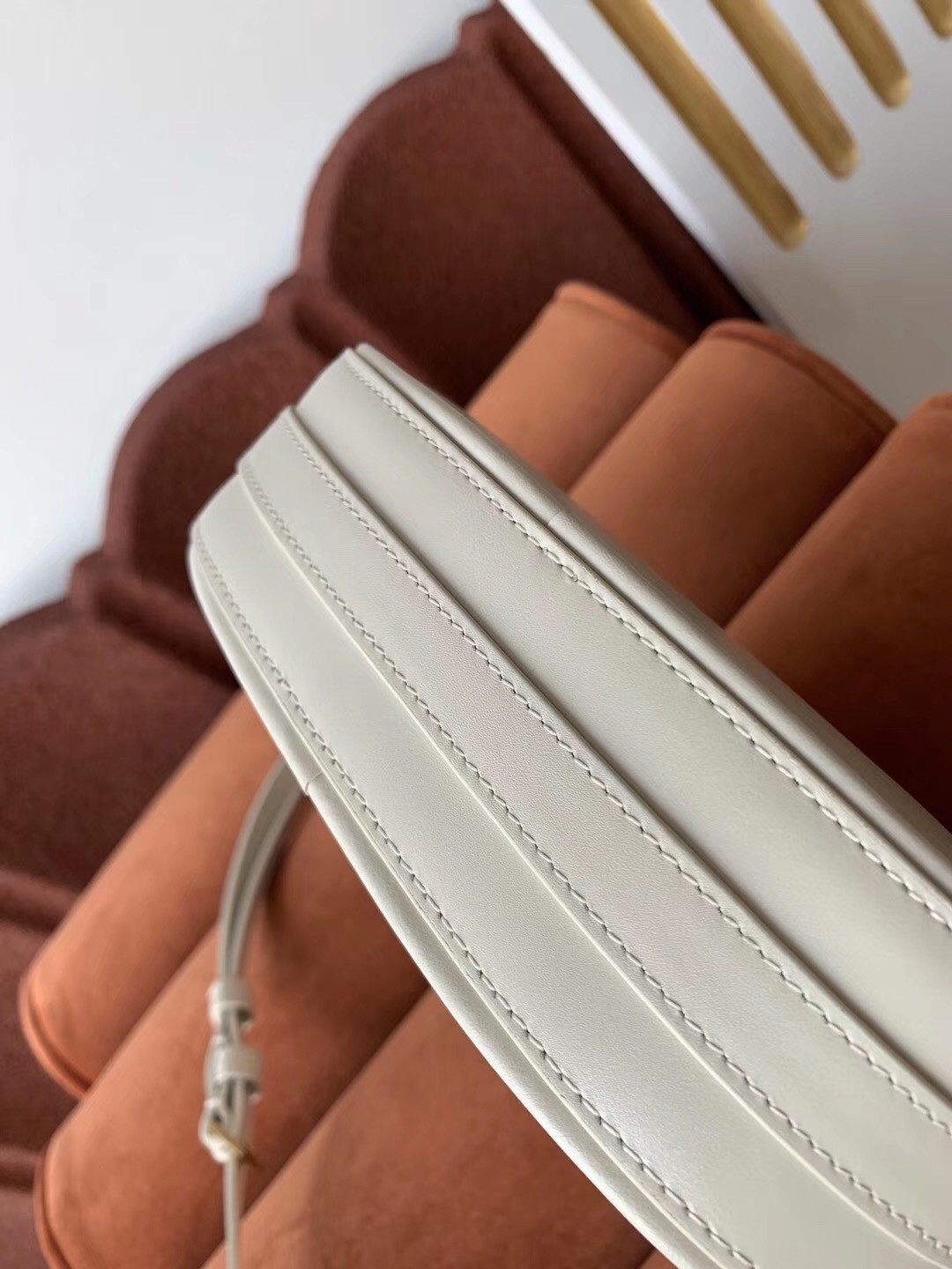Sa**t Lau*nt le 61 camera bag in white leather