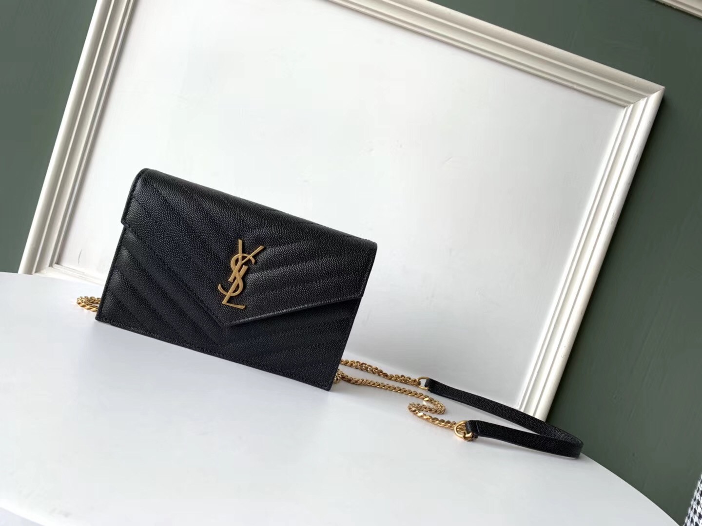 Sa**t Lau*nt woc envelope chain wallet in black leather