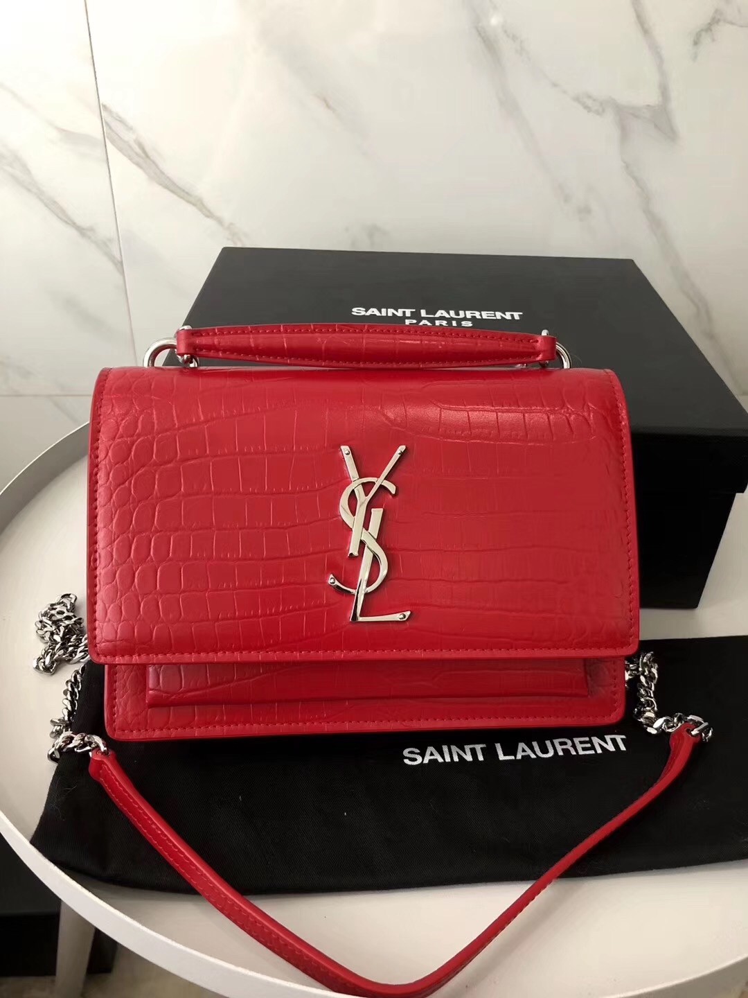 Sa**t Lau*nt woc sunset chain wallet in red croc-embossed leather