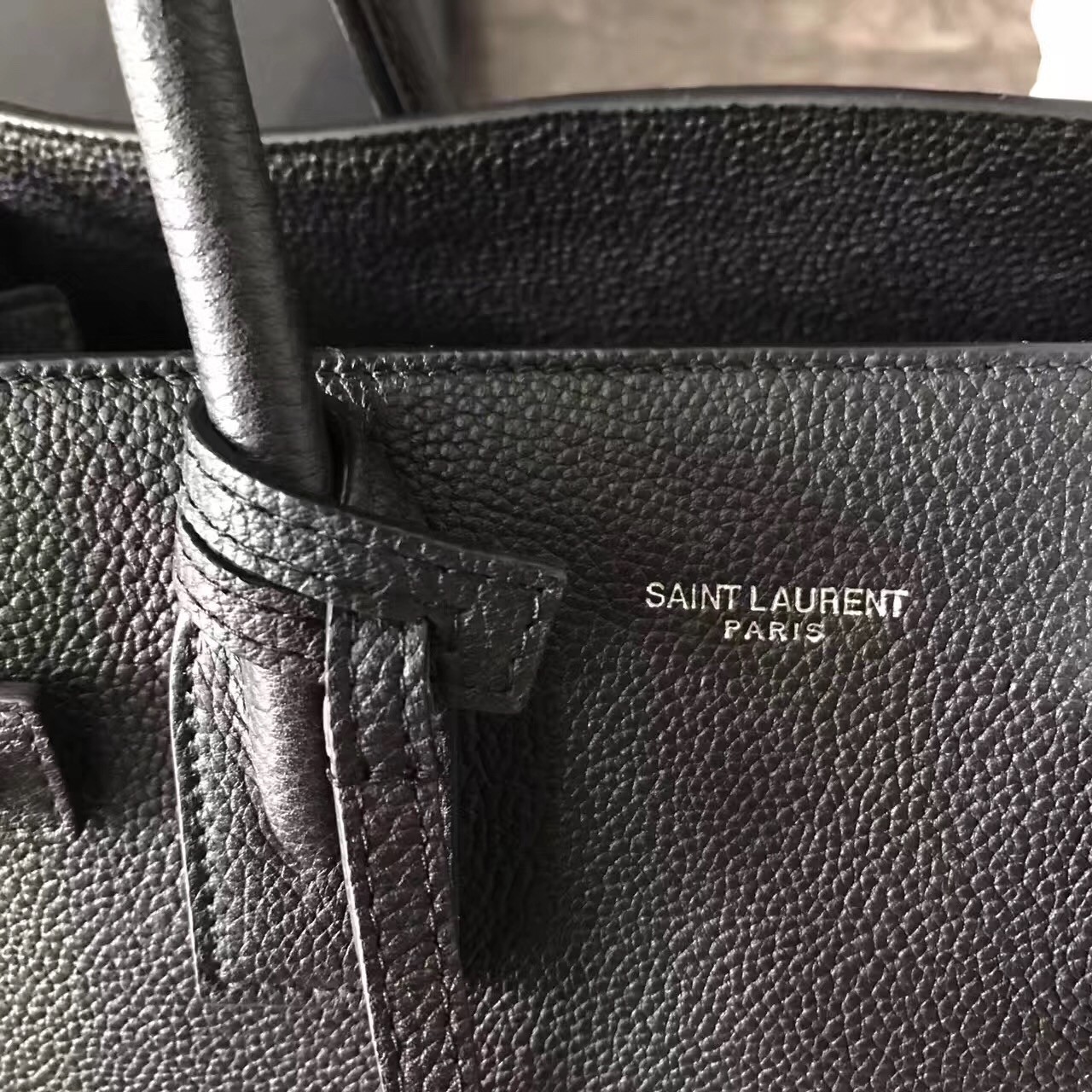 Sa**t Lau*nt baby sac de jour souple bag in black grained leather