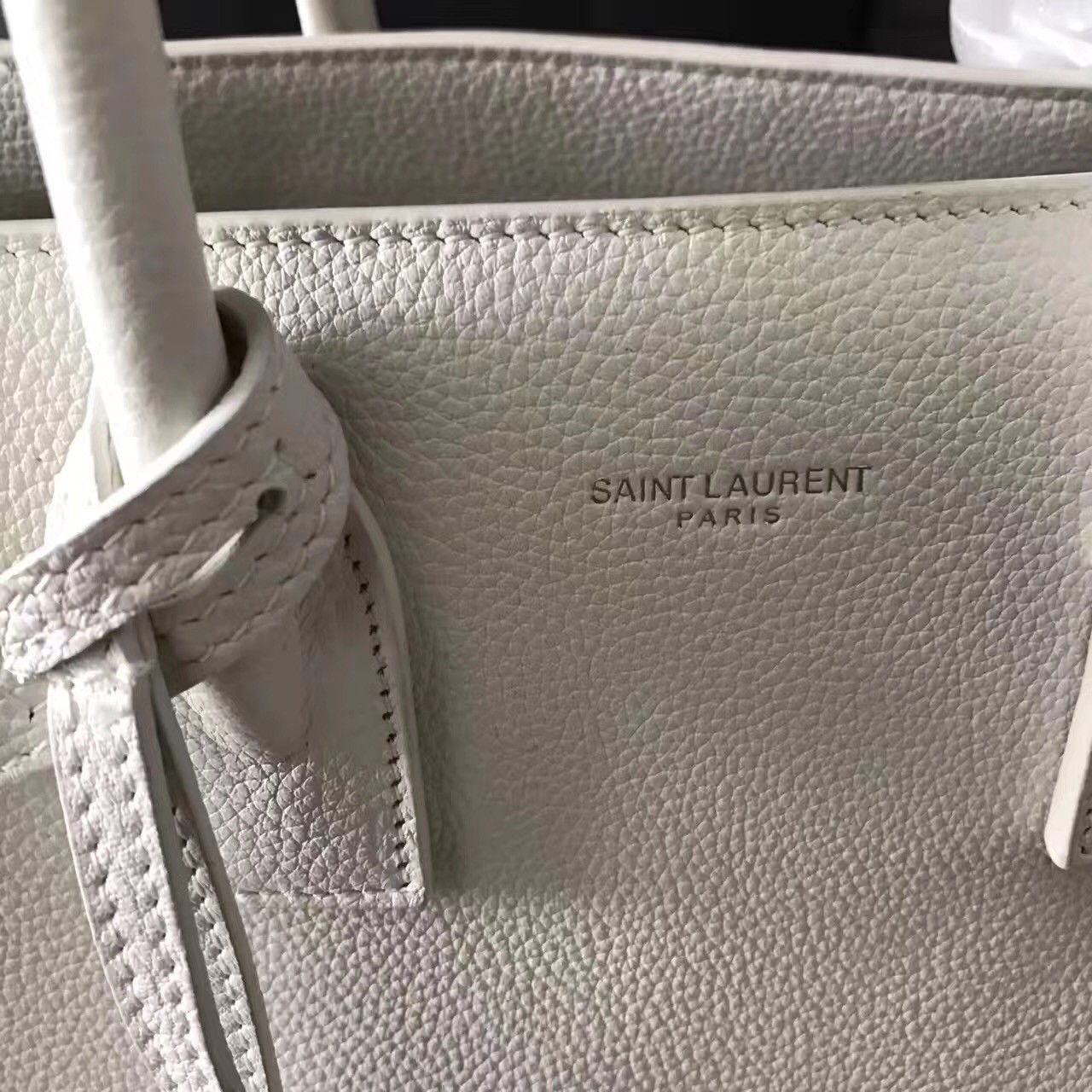 Sa**t Lau*nt baby sac de jour souple bag in white grained leather