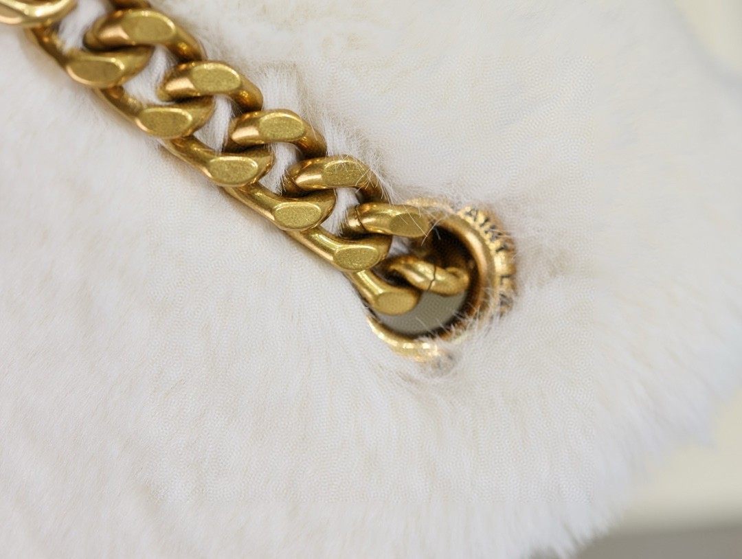 Sa**t Lau*nt niki oversized shoulder bag in white shearling