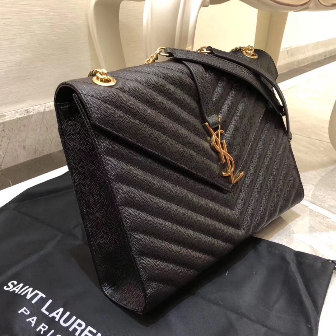 Sa**t Lau*nt envelope large bag in black quilted leather